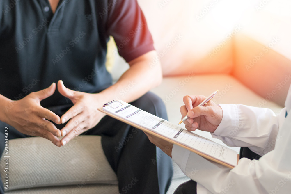 Urologist Doctor giving consult for prostate problems to patient. Urologic oncologists specialize in treating cancer of the urinary tract and male reproductive organs. Mens health problem concept. - obrazy, fototapety, plakaty 