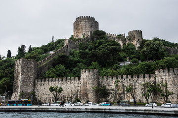 Wall Mural - Cityscapes and scenic views of Istanbul from the Bosphorus River on a grey and overcast day, Turkey