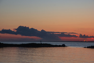 Wall Mural - Sunsets in summer with thunderstorms brewing in Long Island Sound, New York