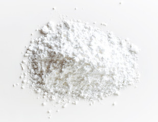 Wall Mural - Heap of powder sugar on white background, from above