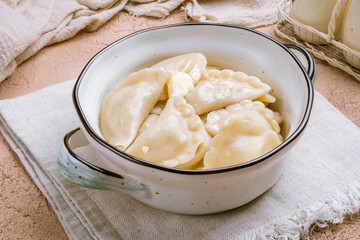 Wall Mural - dumplings with cottage cheese on a plate
