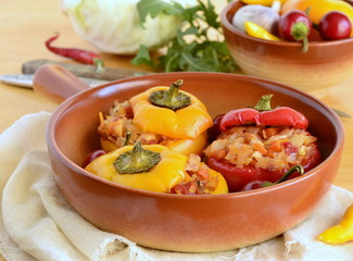 Wall Mural - Baked sweet peppers stuffed with vegetables, vegetarian meal