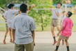 © JinnaritT - Happiness Students play sepak takraw in the afternoon.