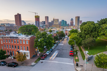 Poster - View of Federal Hill row houses and the Inner Harbor at night, in Baltimore, Maryland