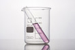 © dohee - beaker and cylinder closeup isolated white.