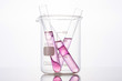 © dohee - beaker and cylinder closeup isolated white.