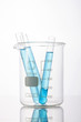 © dohee - beaker and cylinder closeup isolated white.