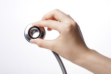 Hand Hold A Stethoscope Isolated White.