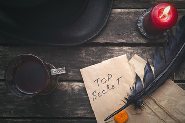 Wall Mural - top secret documents in the envelope on the detective agent table. security.