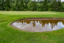 Bunker Full Of Water On A Golf Course