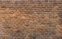 Brick Wall Background. Uneven Brick Texture.