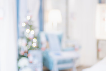 Leinwandbilder - Christmas tree with light string and ball decoration with abstract blur living room bokeh light background at home,Backdrop for winter festive holiday celebration concept.