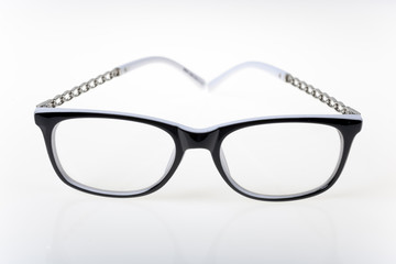 Close-up view on eyeglasses on white background