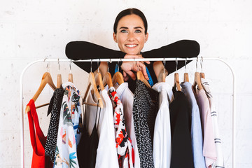 Smiling young woman clothes designer