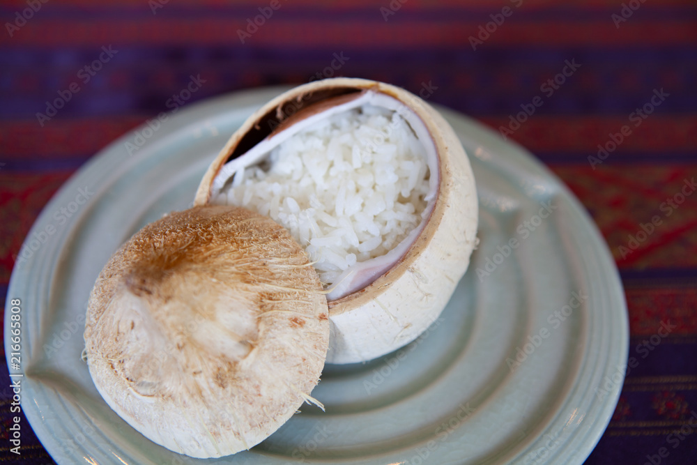 Jasmine rice in young coconut shell. Beautiful and rustic ...