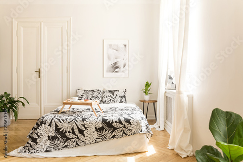 Comfortable Big Bed With White And Black Flower Design