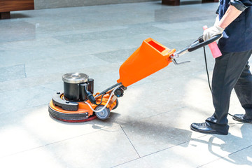 Wall Mural - cleaning floor by washing machine