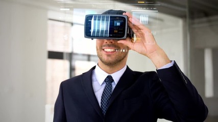 Wall Mural - business, technology and augmented reality concept - businessman with vr headset and cube 3d rendering on virtual screen at office