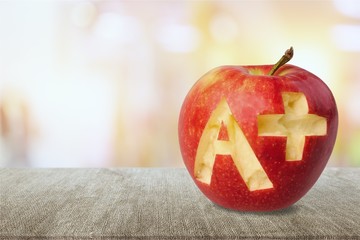 Wall Mural - Photo of red apple with A+