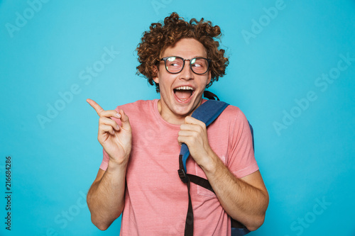 Photo Of Hipster Geek Man With Curly Hair Wearing Glasses And
