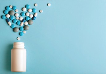 Canvas Print - Medication pills bottle on background