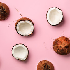 Wall Mural - pattern with ripe coconuts on pink background. top view. copy space. square crop. pop art design, cr