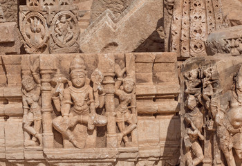 Canvas Print - Carved broken walls of Hindu temples with sculptures of Shiva lord and other, Chitaurgarh fort. Rajasthan of India.