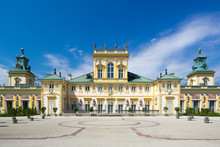 The Royal Wilanow Palace In Warsaw, Poland, With Gardens, Statues And River Around It