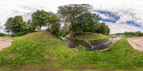Wall Mural - full seamless spherical panorama 360 by 180 degrees angle view on the shore of width river near the bridge in summer day in equirectangular projection, ready for VR virtual reality content