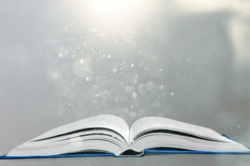 Wall Mural - open book on old wooden table