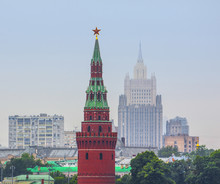 Moscow Kremlin Tower On The Background Of Tall Buildings