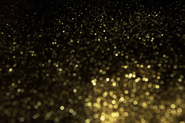 Abstract gold background. Glitter vintage lights background.