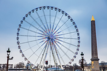 Wall Mural - Wheel of Paris and Luxor Obelisk at the Place de la Concorde in a cold winter day