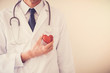 © SewcreamStudio - Doctor holding red heart with stethoscope, heart health,  health insurance concept