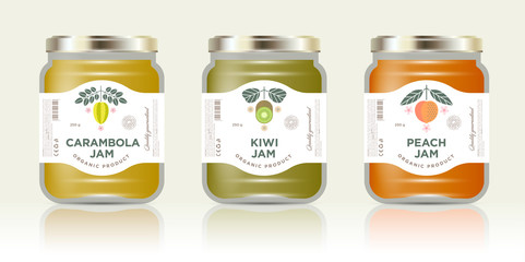 Wall Mural - Three jars with labels fruit jam. Three jars mockup. Carambola or star fruit, kiwi, peach jam packaging. Premium design. The flat original illustrations on the minimalist labels.