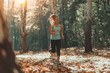 © Microgen - Woman Jogging Outdoors in The Fall
