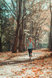 © Microgen - Woman Jogging Outdoors in The Fall