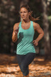 © Microgen - Woman Jogging Outdoors in The Fall