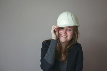 Young woman with hard hat