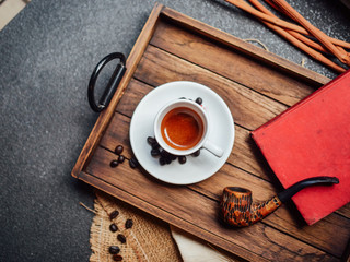 Wall Mural - Close up hot coffee on wooden background.