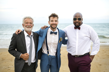 Wall Mural - Groom talking to his groomsmen