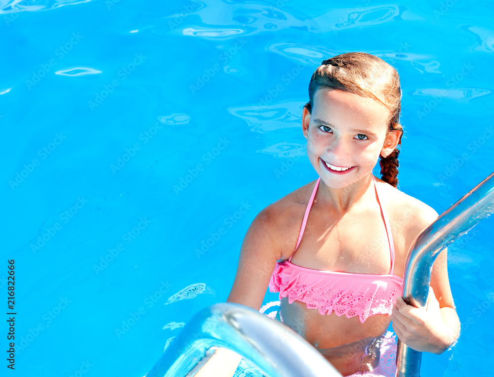 Cute smiling happy little girl child in swimming pool Stock Photo ...
