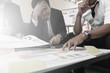 © only_kim - business team discussing  strategy and planning  project to investment at office
