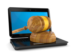 Canvas Print - Gavel inside laptop