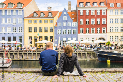Tourists enjoying the scenic summer view of Nyhavn pier Canvas Print