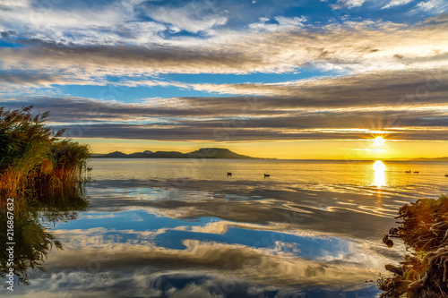 Fotografia  Beautiful colorful sunrise, lake Balaton in Hungary
