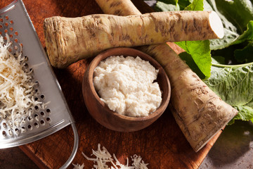 Poster - Raw horseradish roots and grated horseradish.