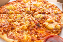 Close Up Of Tasty Hawaiian Pizza With Ham And Pineapple