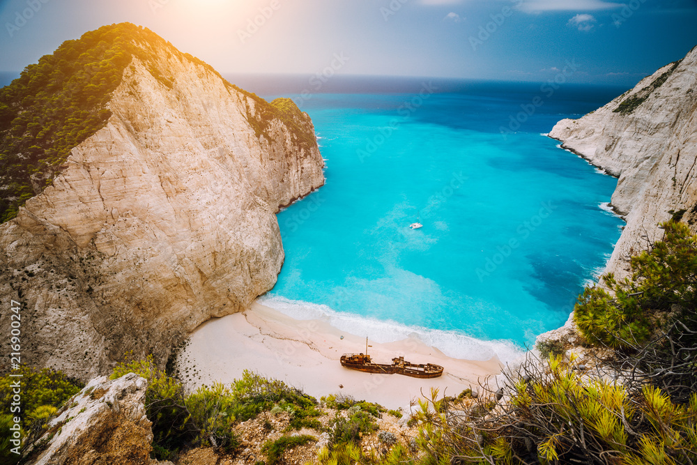 Obraz na płótnie Shipwreck on Navagio beach. Azure turquoise sea water and paradise like sandy beach. Famous tourist landmark on Zakynthos island, Greece w salonie