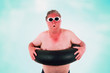 © soupstock - Sunburned man with sunglasses and inner tube